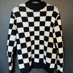 Checkered sweater. Black and white